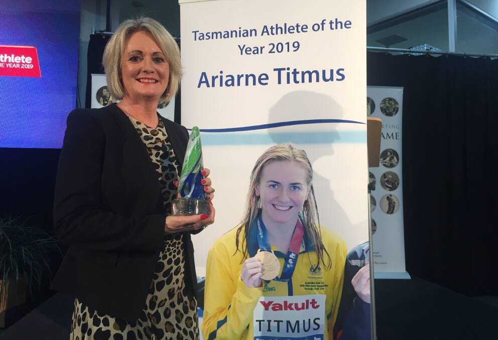Robyn Titmus accepts the award on behalf of her daughter Ariarne. Picture: Rob Shaw