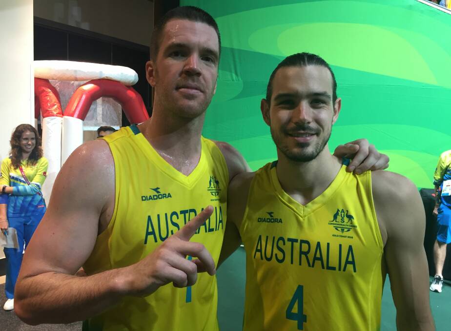 Launceston-born basketballers Lucas Walker and Chris Goulding playing for Australia at the 2018 Commonwealth Games on the Gold Coast. Picture: TIS