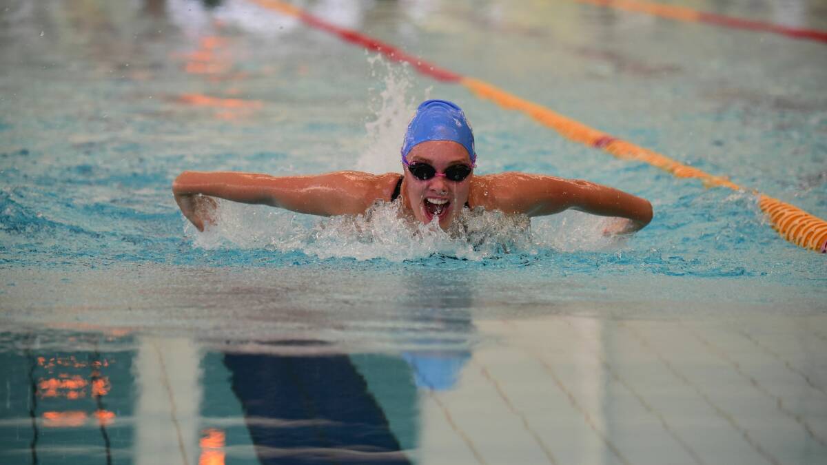 Taking flight 1: Isabele  Rush, 16, of South Esk Swimming Club in the butterfly.