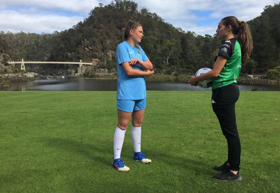 Kicking off: Tasmania's Jess Robinson and Calder United's Julia Sardo look ahead to their upcoming rep match. Picture: Rob Shaw