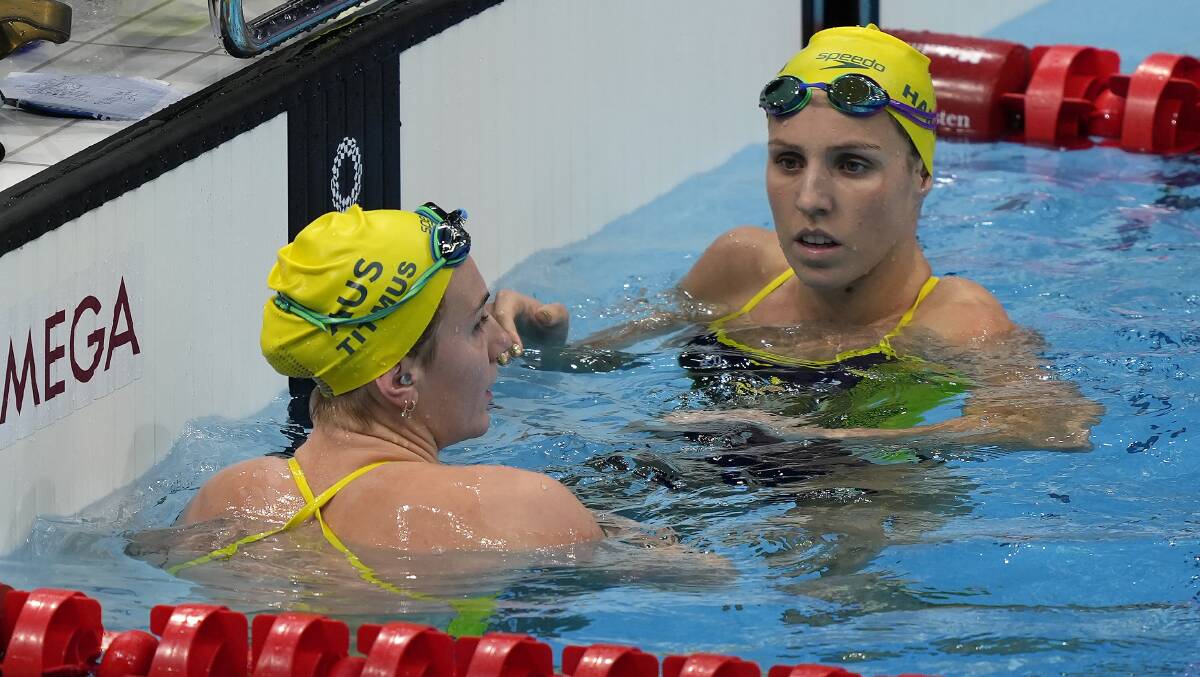 Life in the fast lane: Ariarne Titmus and Abbey Harkin training at the Tokyo Aquatics Centre this week. Picture: AP