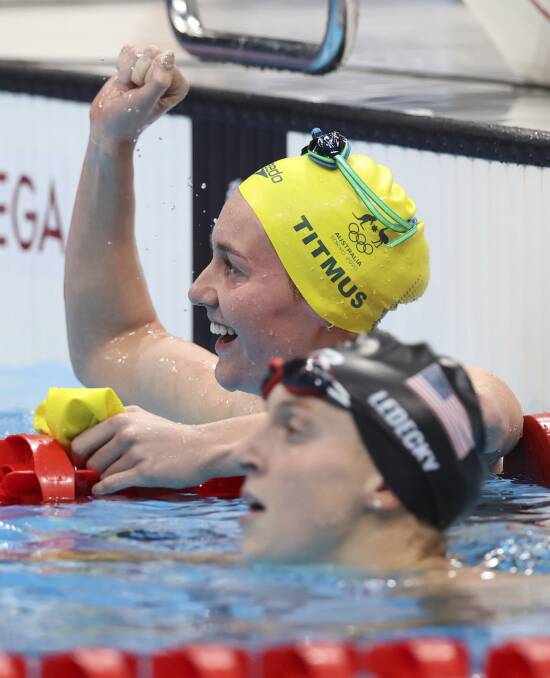 CAP THAT: Ariarne Titmus celebrates her Olympic victory over American Katie Ledecky. Picture: AP