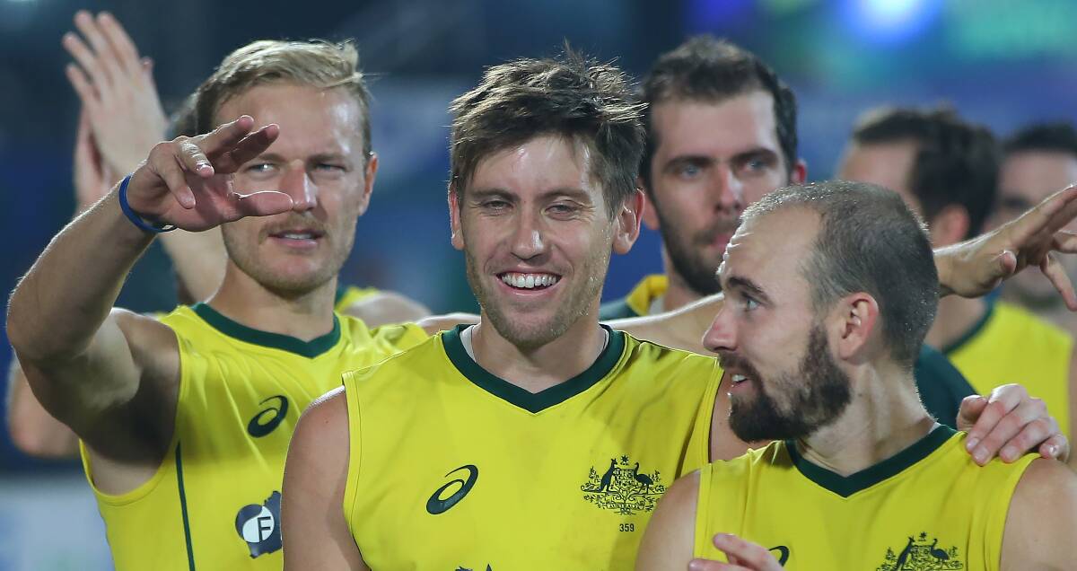 Team players: Olympians Tim Deavin and Eddie Ockenden, with Kookaburras teammate Matthew Swann, will both be back in action for Tasmania this week. Picture: Getty Images