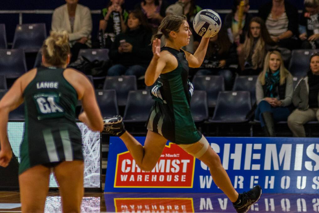 Leaping large: Tasmanian Magpies' Kelsie Rainbow giving it her all against the Queensland Fury at the Silverdome last season. Rainbow will now co-captain the team alongside Victorian Melissa Bragg. Picture: Phillip Biggs