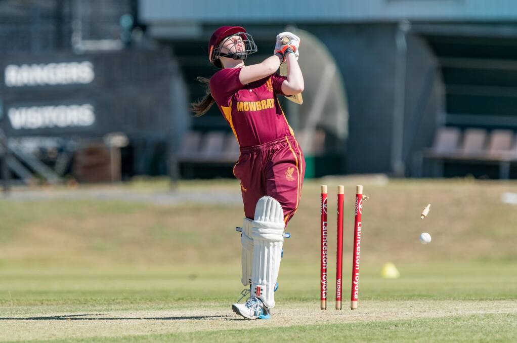 BAILS GO FLYING: Mowbray batter Phoebe Atkins is bowled by Alice McLauchlan on Saturday. 