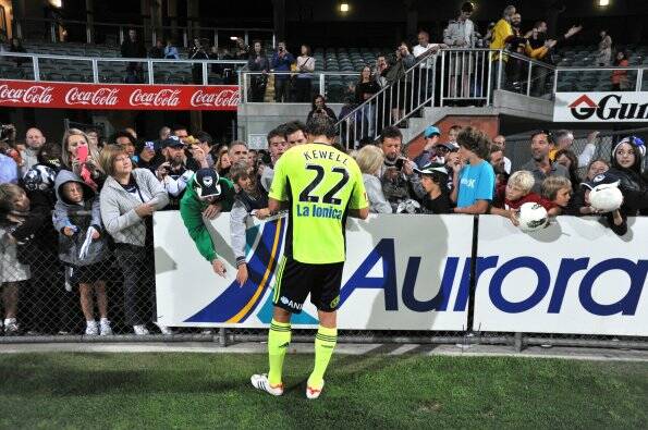 STAR POWER: Socceroo Harry Kewell signs autographs when Melbourne Victory played in Launceston in 2012. Picture: Scott Gelston