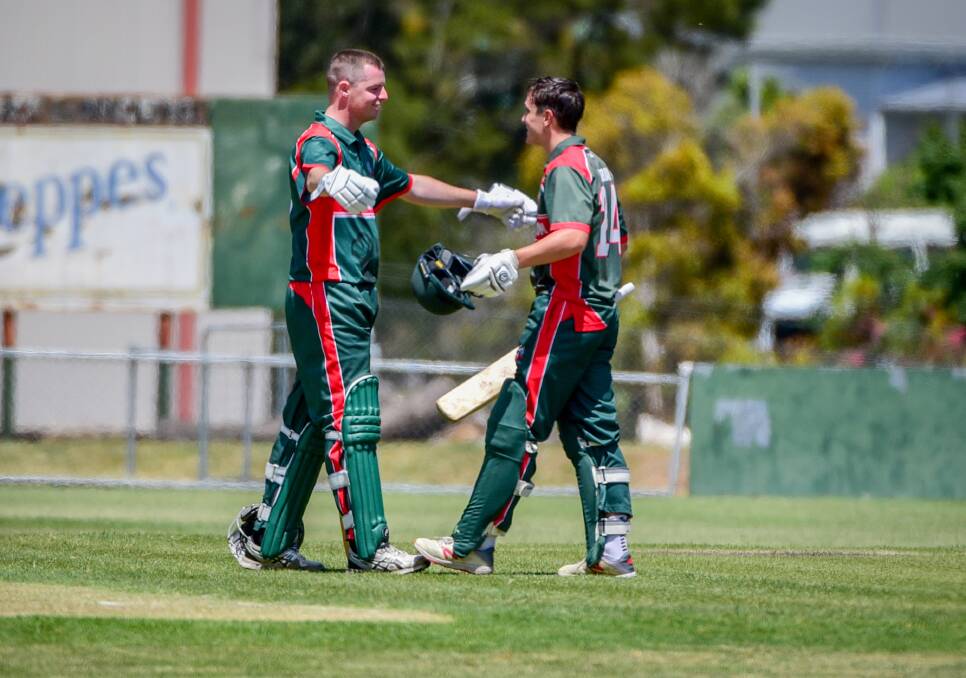 DOUBLING UP: Launceston batsmen Ben Humphrey and James Curran celebrate as both made centuries in the win against Westbury. Picture: Paul Scambler