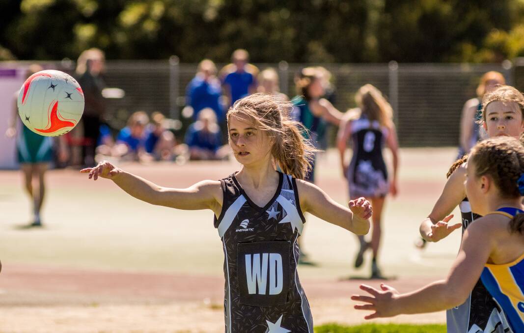 HOME ADVANTAGE: Northern Tasmanian Netball Association wing defence Emelia Wells in action on Sunday as Hoblers Bridge hosted the association's statewide junior netball carnival. Picture: Phillip Biggs
