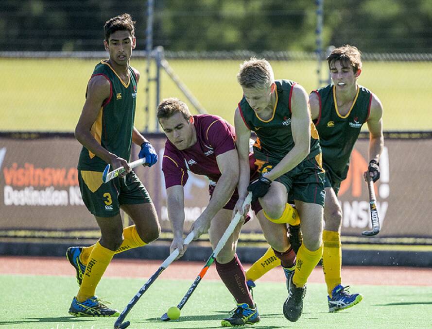 Under pressure: The Tasmanian men's team in action at the under-21 national championships in Wollongong. Picture: Click In Focus.