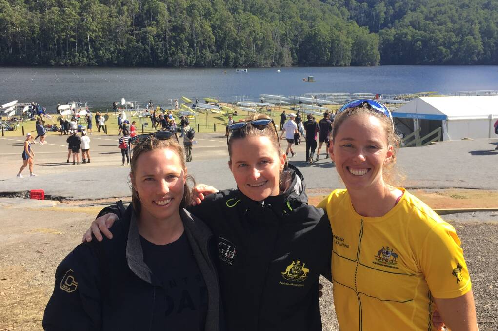 NATIONAL PRIDE: Tasmania's national representatives Ciona Wilson (centre) and Sarah Hawe (right) catch up with ex-teammate Meaghan Volker.