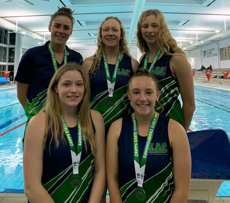 Winners circle: Relay record-breakers (back, from left) Dawson Howell, Amy Muldoon and Georgia Woods; and (front) Jade Nichols and Chelsea Savage at the Launceston Aquatic Centre. Picture: Sally Morgan