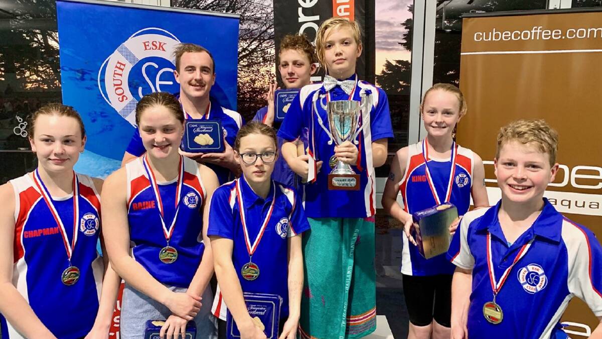 The Curran Cup relay team of Lilly Chapman, Taylor Raine, Kit DeJonge, Caitlin Knowles, Hugh Dolle, Samuel Fischer, Abbie King and Oliver Atkins.