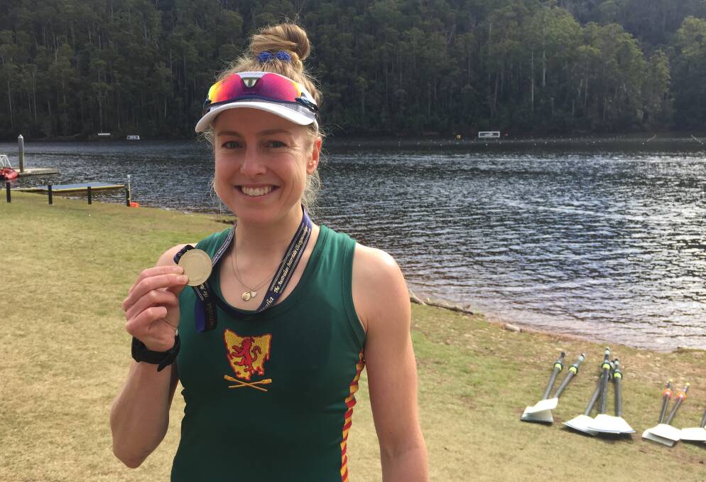Golden chance: Georgia Nesbitt shows her gold medal from Tasmania's lightweight women's quad scull success at Lake Barrington last month. Pictures: Rob Shaw