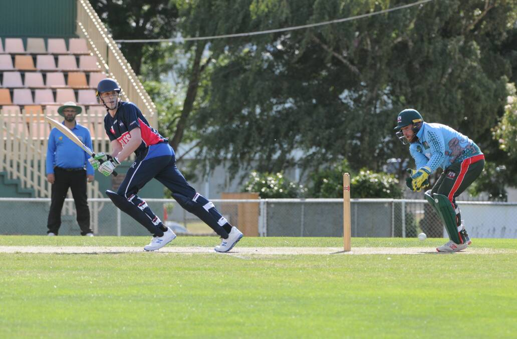 Riverside's Daniel Forster glances one past Launceston wicket-keeper Alistair Taylor.