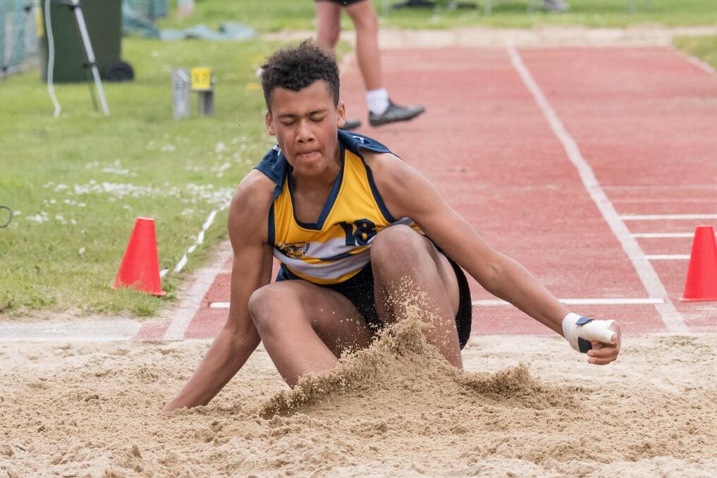 TOUCHDOWN: Exeter High School's Avery Thomas in the under-14 long jump. Picture: Phillip Biggs
