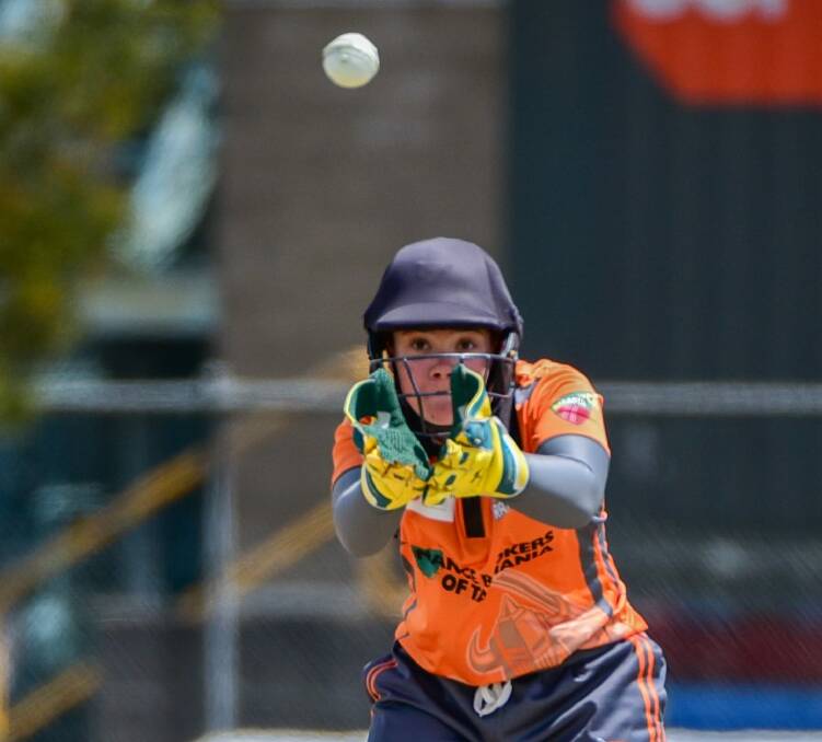 Getting her eye in: Emma Manix-Geeves fields a throw from the deep.