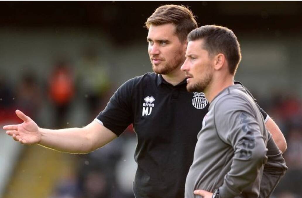 Brains trust: Michael Jolley and Anthony Limbrick coordinate proceedings at Grimsby.