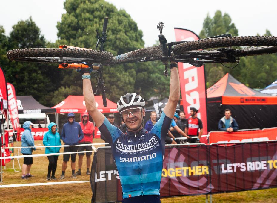 HIGH SPIRITS: Sam Fox celebrates victory in the customary manner at the Australian Mountain Bike Championships. Pictures: Australian Mountain Bike Magazine