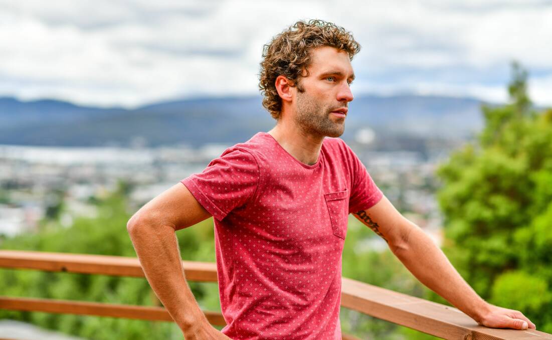 Change of scenery: Nathan Earle at his Hobart home before heading off to Taiwan. Picture: Scott Gelson