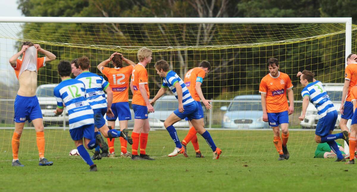 Riverside players hold their heads after Bryton Rush heads in Somerset's late winner. Picture: Neil Richardson