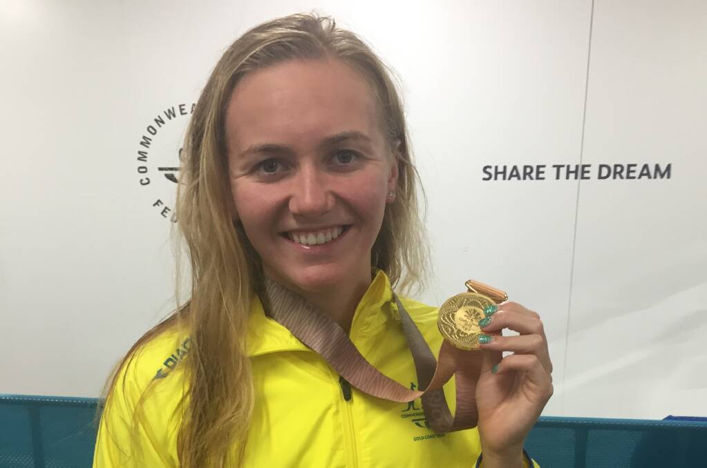 Golden smile: Ariarne Titmus with her relay gold medal.