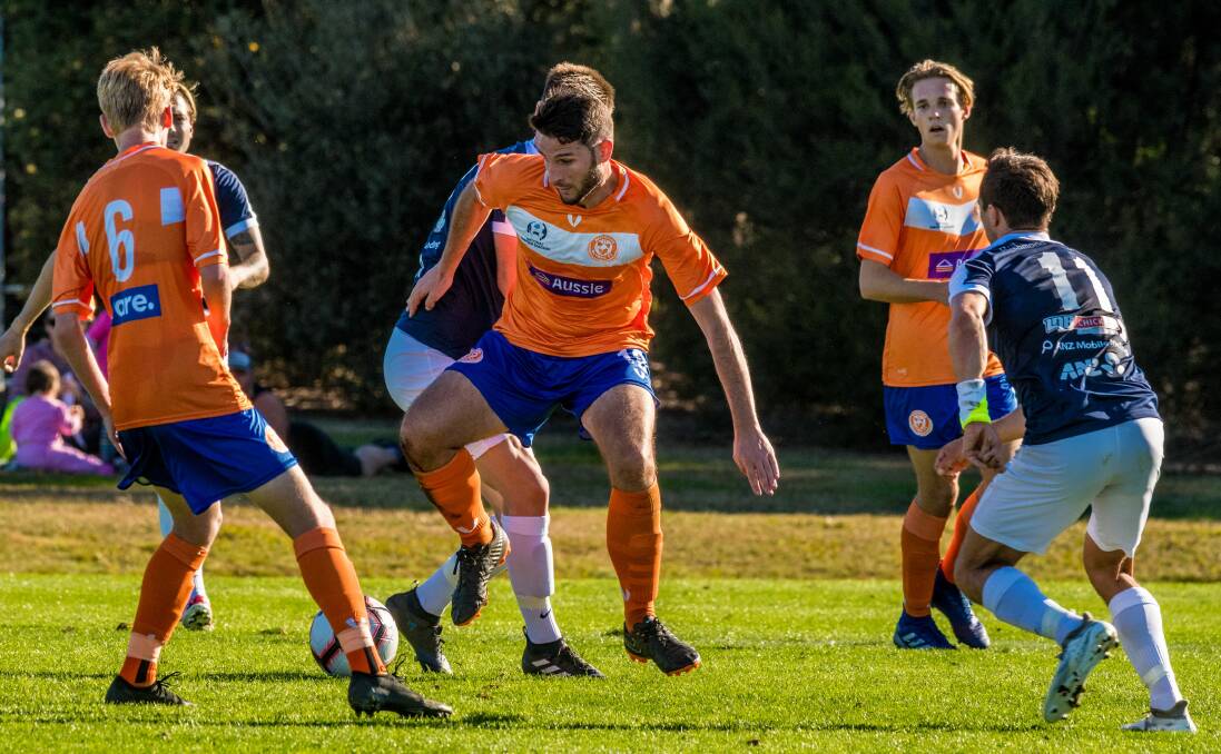 Where to go: Jonathon O'Neill keeps the ball for Riverside Olympic against South Hobart on Saturday. Picture: Phillip Biggs