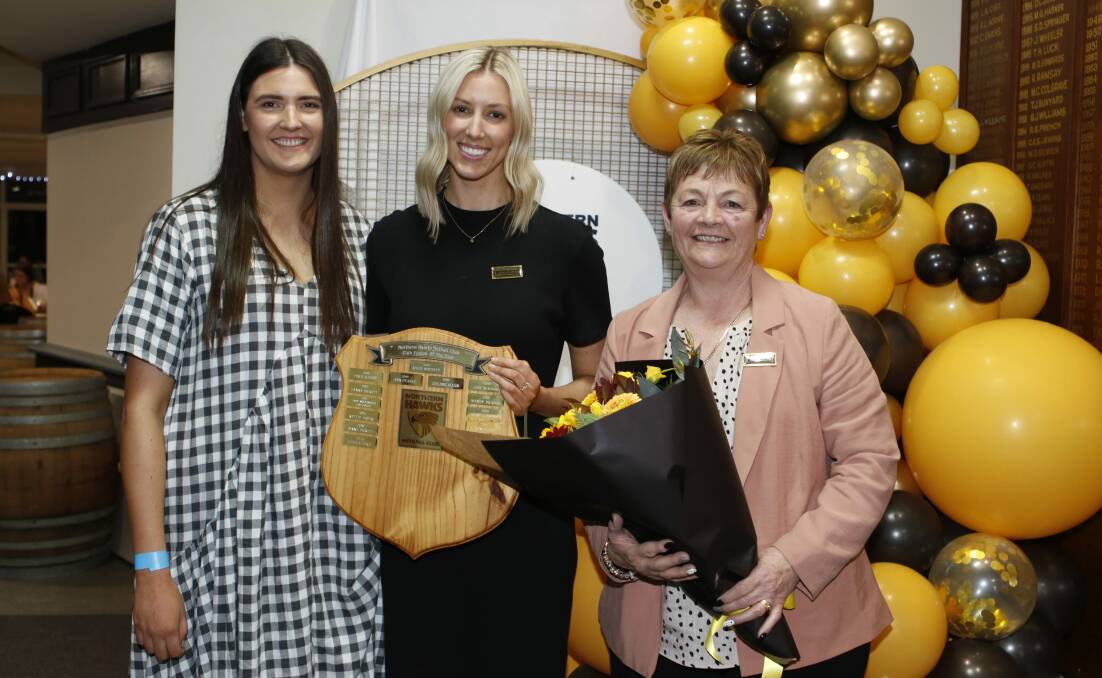 Swooping in: Ann Pearce (right) with captain Gemma Poke and club person Danni Pickett at the Northern Hawks presentation dinner last month. Picture: Jess Stevenson