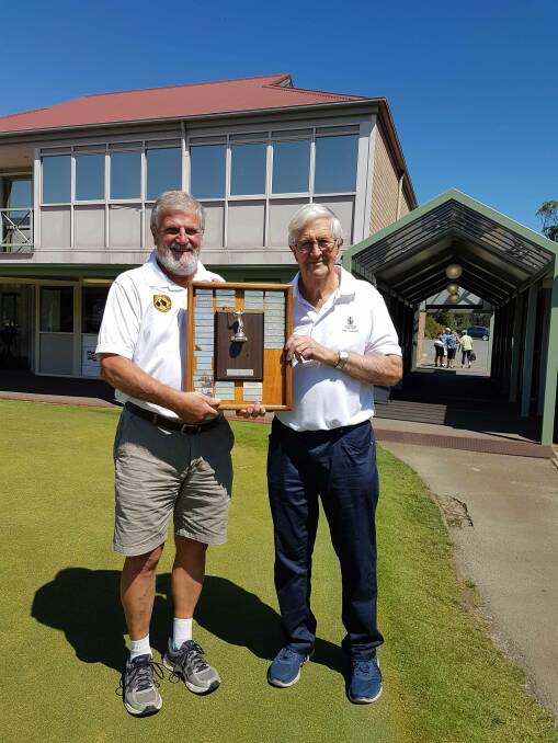 Tri again: Acting president Steve Manson with Launceston's Rob Dowling after his victory in the triangular Riverside Shield.