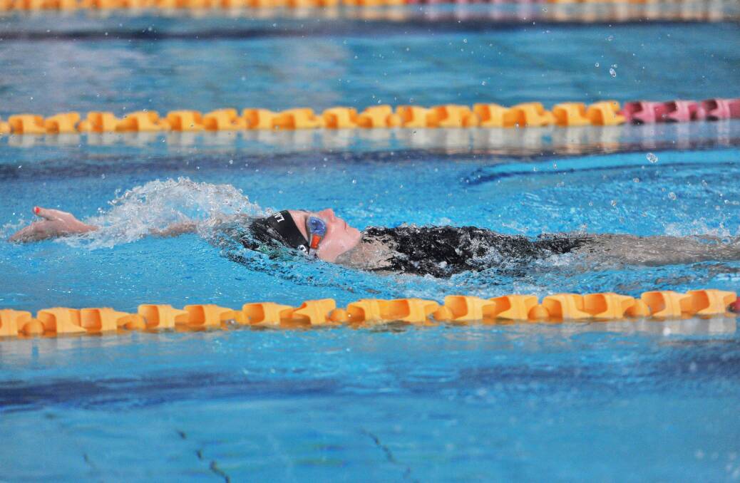 Launceston Aquatic's Dakota Leonard in the under-10 girls 50m backstroke.