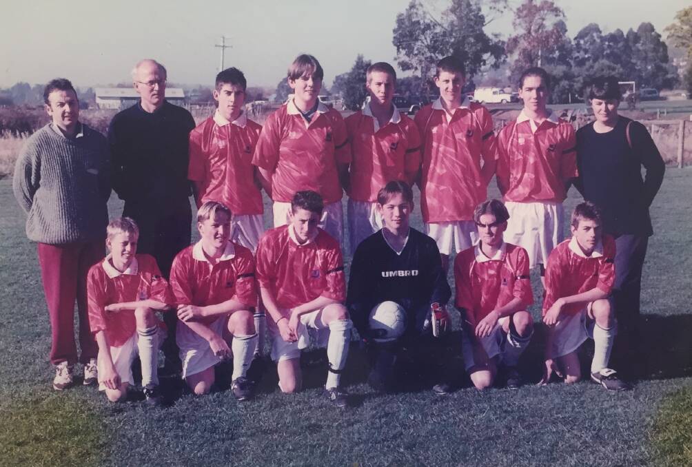 Fresh faced: Anthony Limbrick (front row, third from left) with Riverside Olympic under-17s in 1999. Coach Mark Gaetani (back left) is the father of the club's newly-appointed head coach Alex.