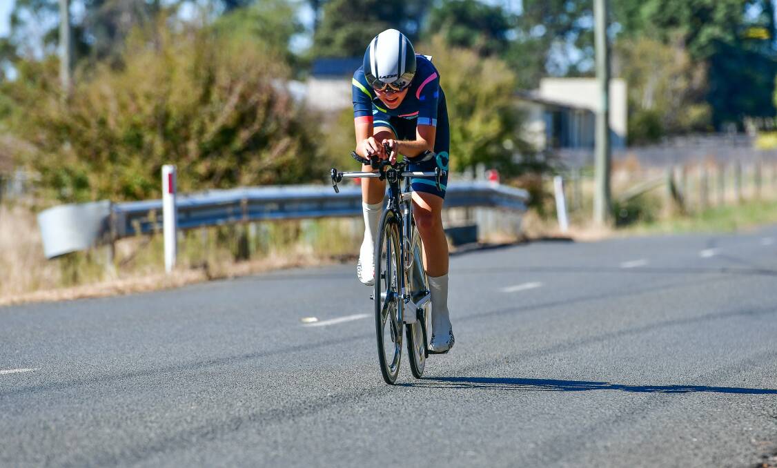 Queensland's Fran Sewell heading for victory during the under-19 women's time trial.