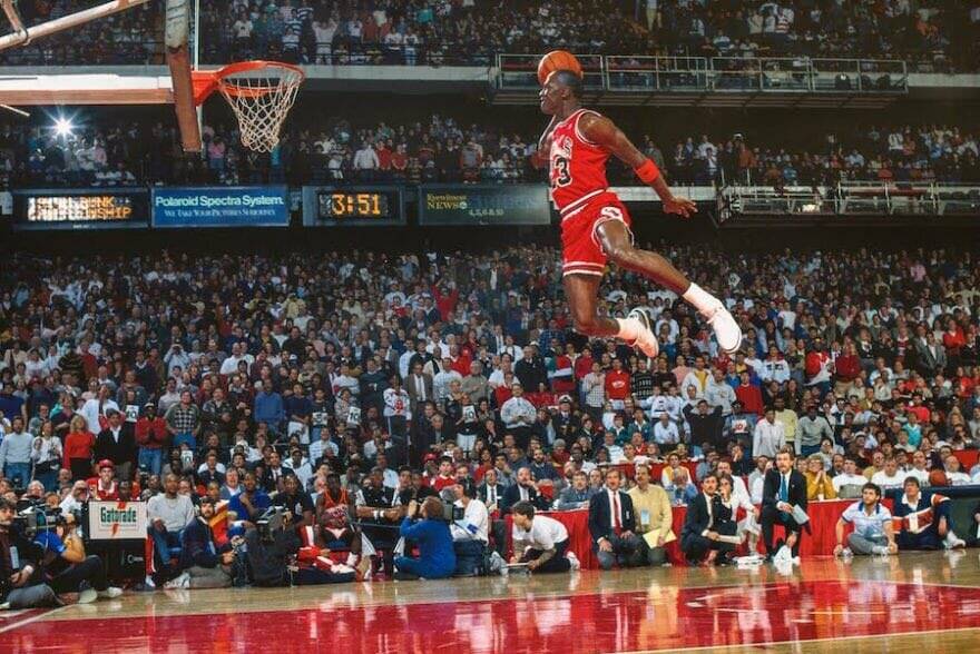 Flying high: Michael Jordan in trademark pose for the Chicago Bulls. Picture: Twitter