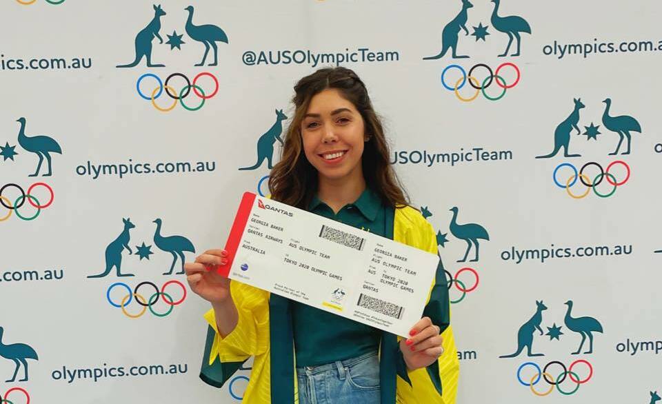 Baker's delight: Georgia Baker with her ticket to the Tokyo Olympic Games.