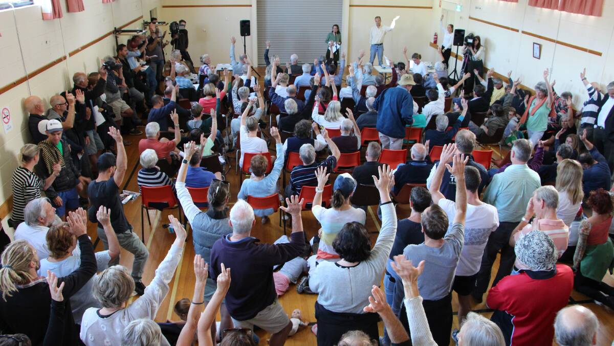 Many hands: Coles Bay residents discuss whether to cap visitation to Freycinet National Park. Picture: Supplied