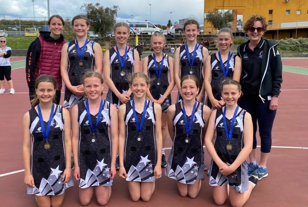 VICTORIOUS: The NTNA 12-and-under rep team with their winners' medals. Pictures: Facebook
