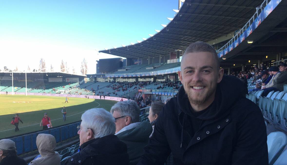Laud above: Hugh Greenwood in the UTAS Stadium crowd on Saturday. Picture: Rob Shaw