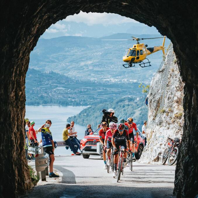 TUNNEL VISION: Richie Porte helping INEOS Grenadiers teammate Richard Carapaz before being forced to withdraw from this year's Giro d'Italia due to illness. Picture: Twitter