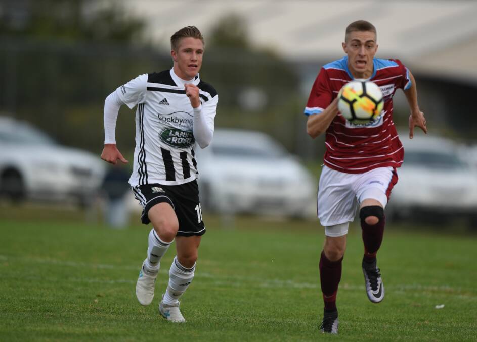 On the run: Launceston City's Jarrod Linger and Northern Rangers' Alex Fulton chase the ball when the teams met at Prospect in April. Picture Paul Scambler.