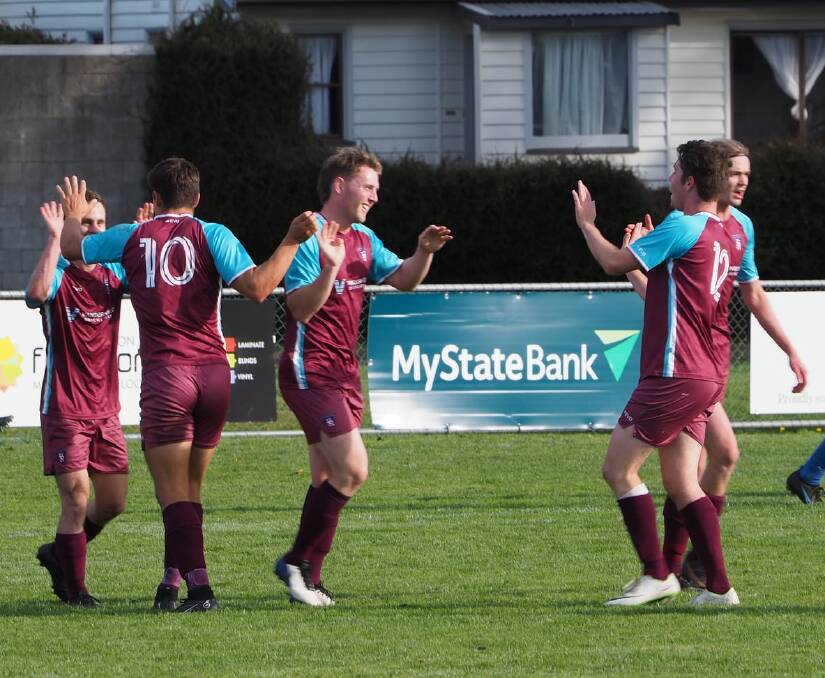 HIGH FIVES: Northern Rangers celebrate one of five goals against Launceston United on Saturday. Picture: Facebook