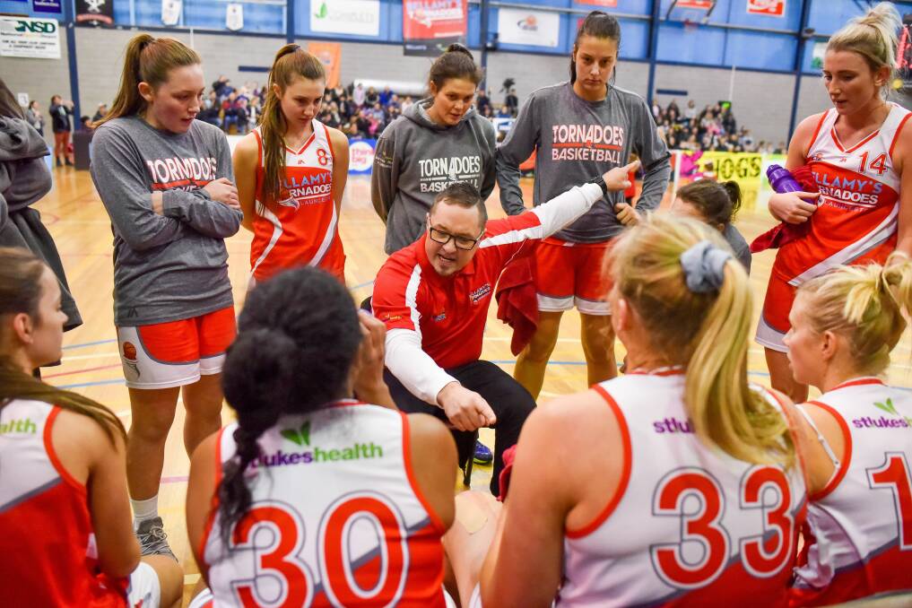 Making a point: Tornadoes coach Richard Dickel will make sure his players know which direction to send the Hobart Lady Chargers. Picture: Scott Gelston