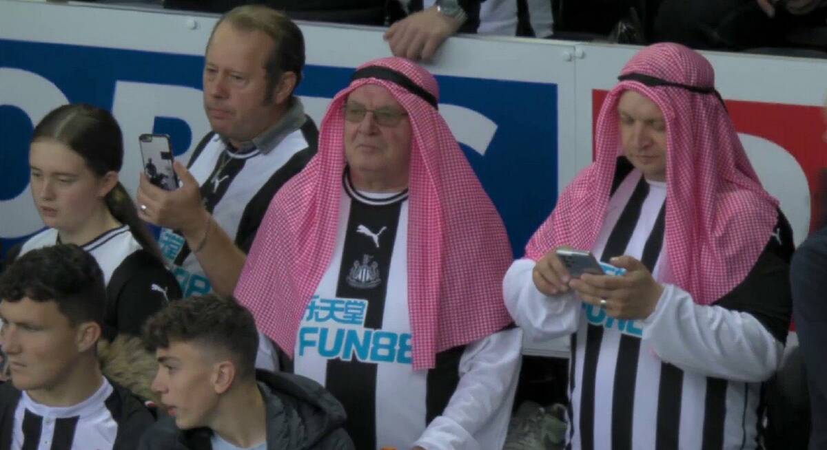 Gone to their heads: Newcastle fans back their new team owners.