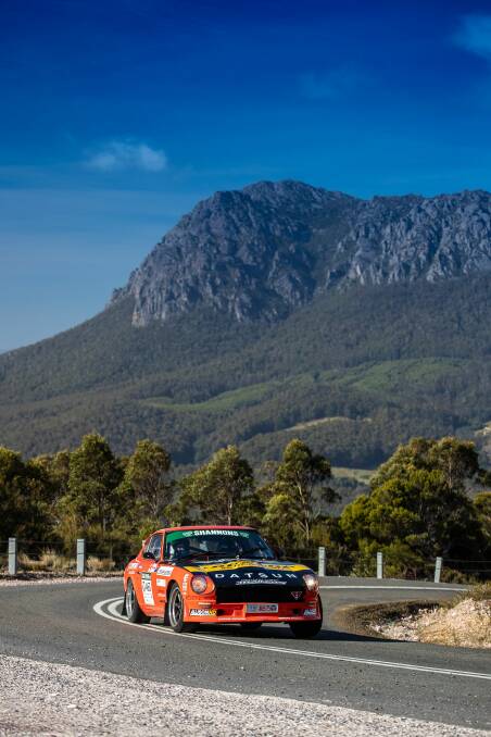 CLIMBING HIGH: The combination of Tasmanian scenery and horse-power has proved a winning formula for Targa Tasmania. Picture: Angryman Photography
