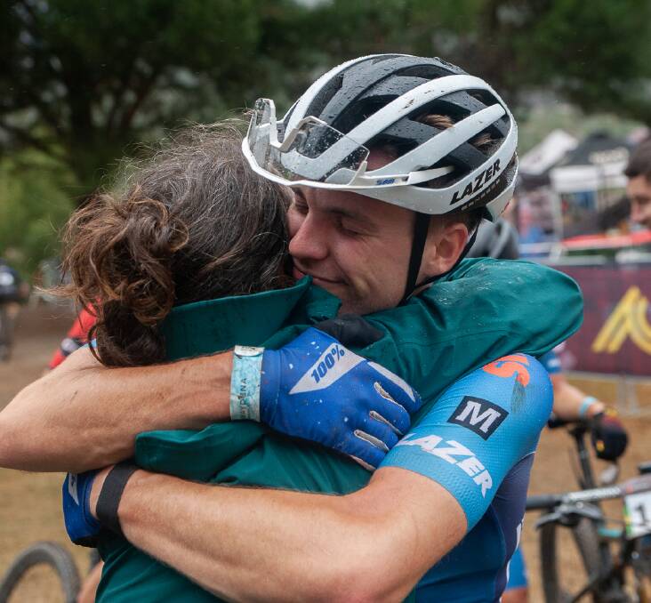 Fox hugs mum Anna after claiming the national title.