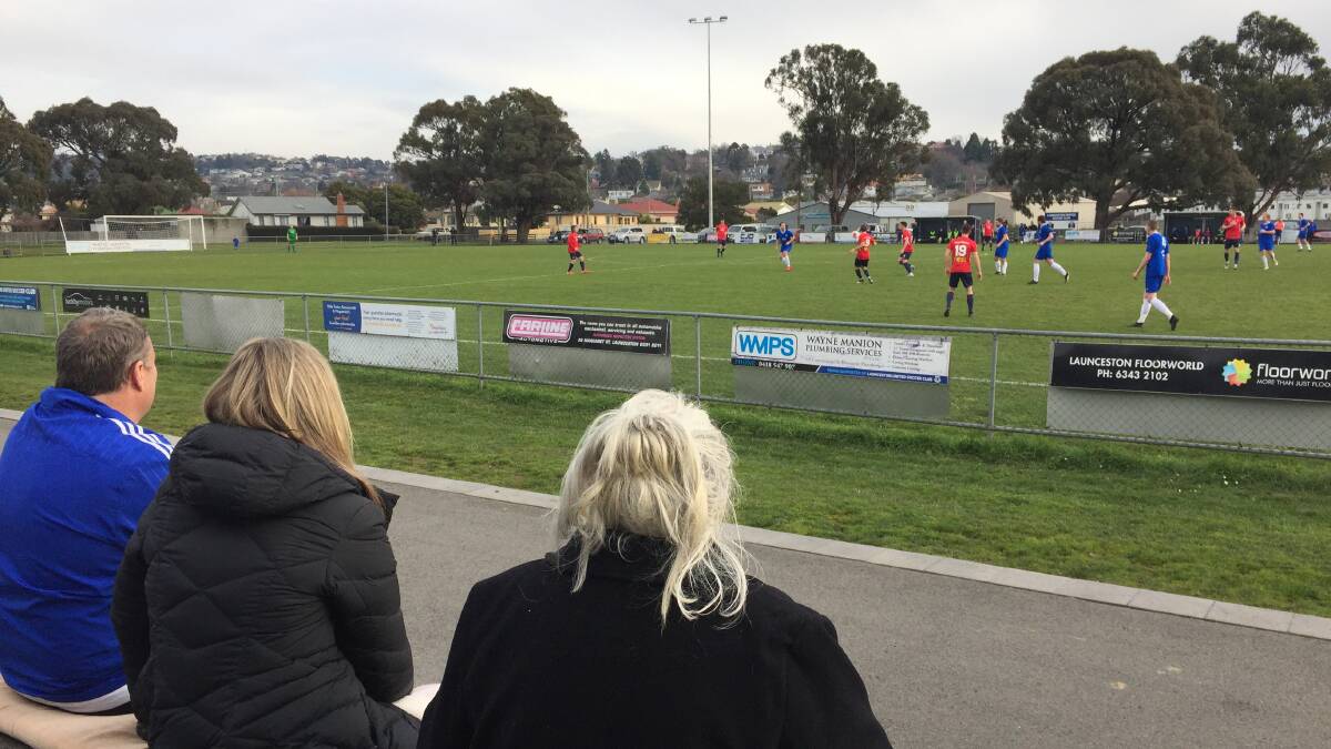 United we sit: Launceston United supporters watch their team take on South Hobart. Pictures: Rob Shaw