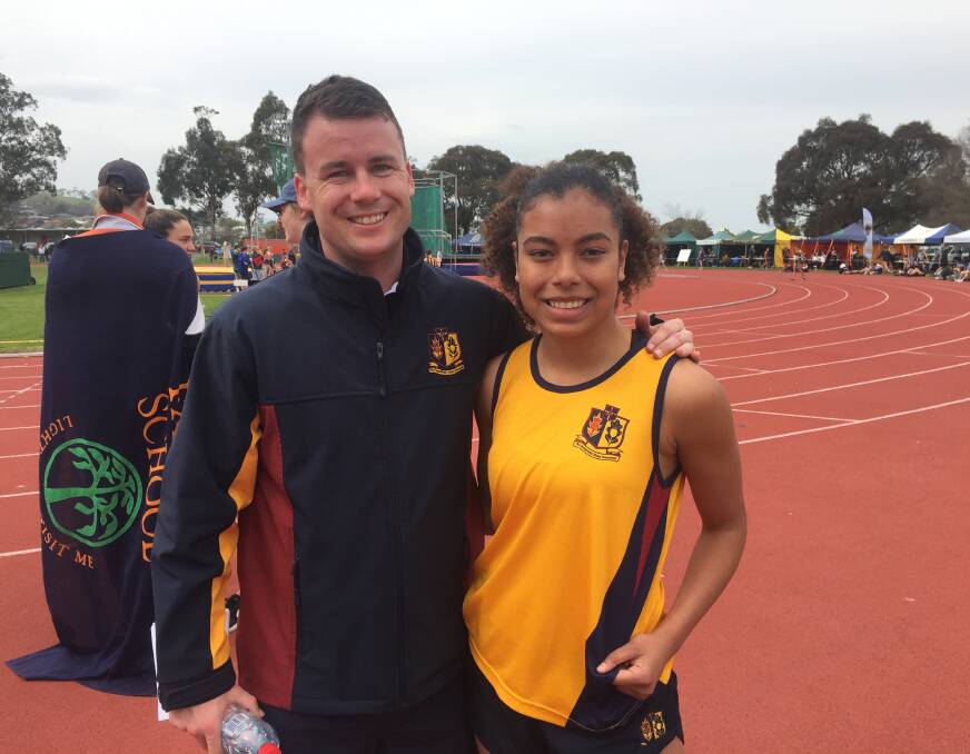 Master and apprentice: Scotch Oakburn teacher Andrew Robinson with Year 11 runner Louise Tyson. Picture: Rob Shaw