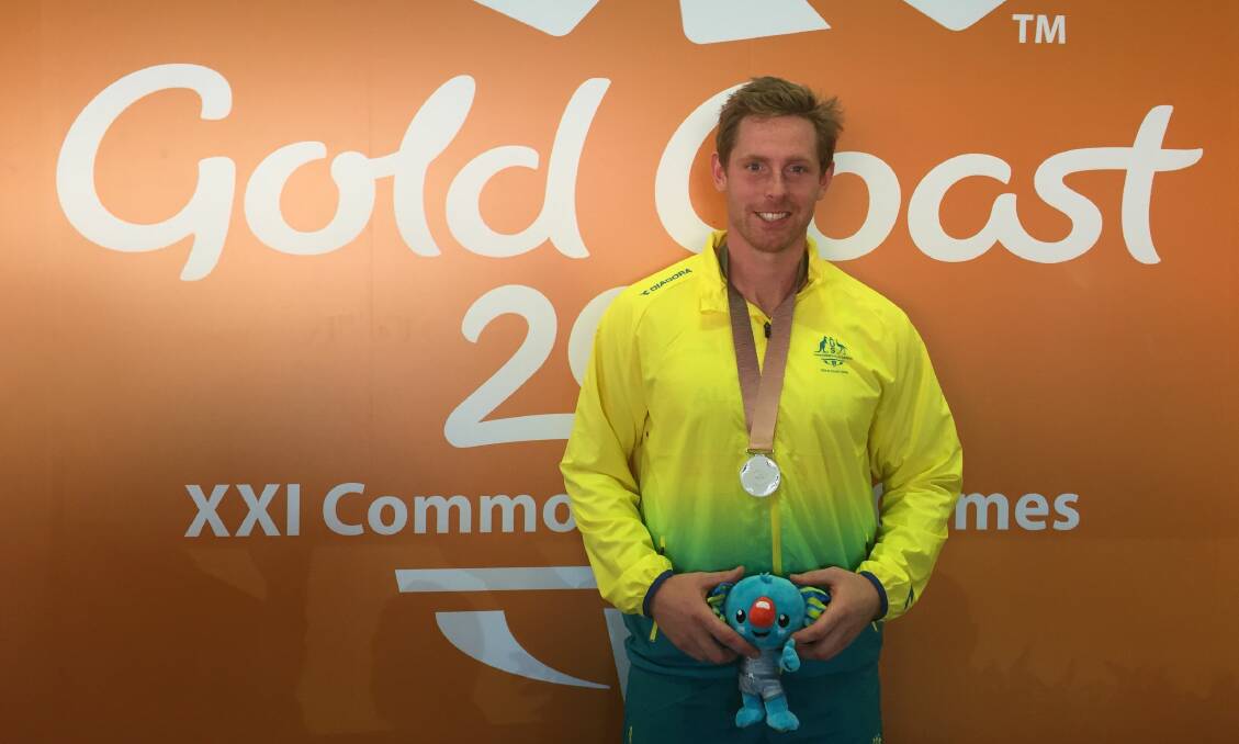Silver lining: Peacock with his medal at the 2018 Commonwealth Games. Picture: TIS