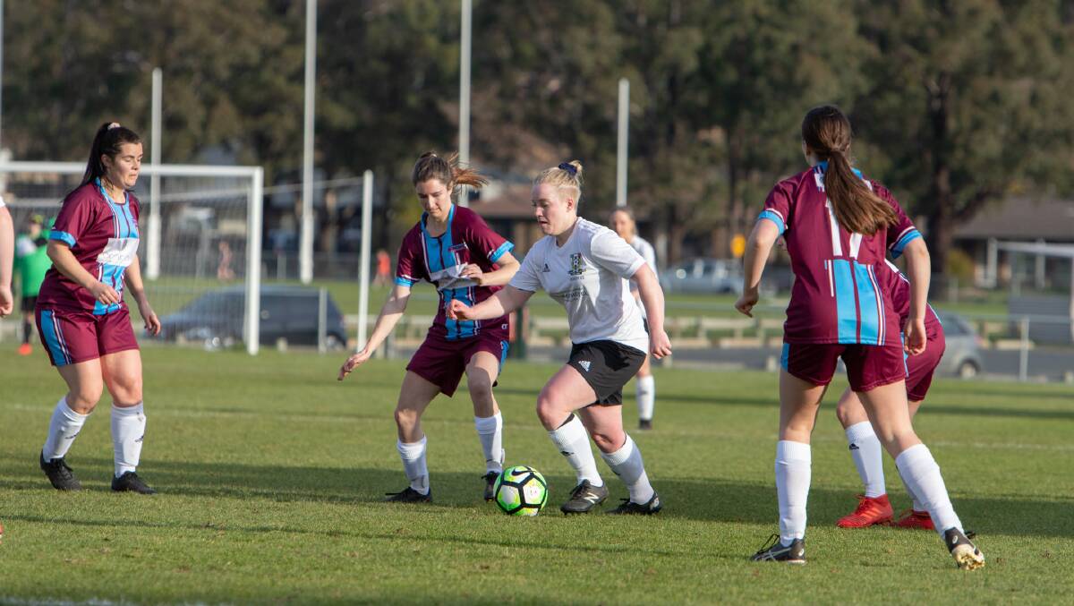 NEIGHBOURS: Launceston City's Kiara Walsh and Febey Pearce of Northern Rangers in action earlier this season. Picture Jamie Richardson