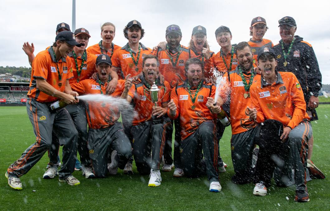 Fizzy Orange: Greater Northern Raiders players celebrate their win. Picture: Linda Higginson, Cricket Tasmania