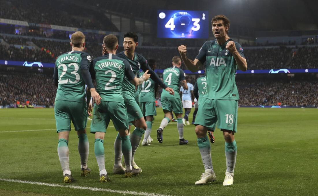 Seventh heaven: Tottenham players celebrate a dramatic result against moneybags Manchester City in the Champions League quarter-finals. Pictures: AP