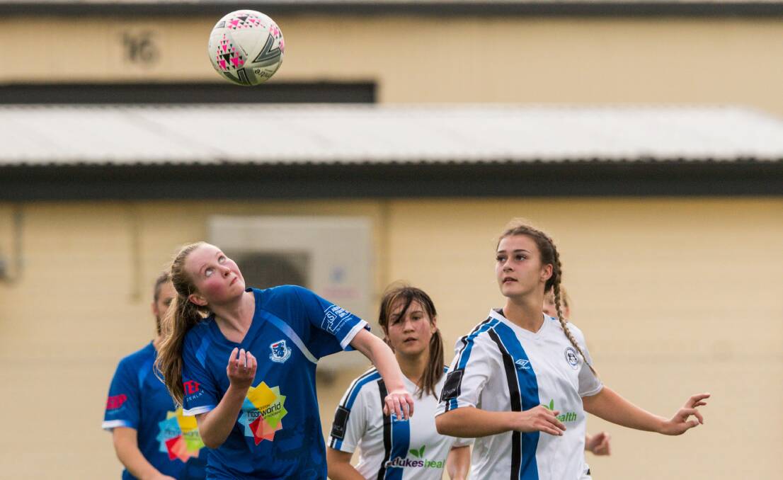 HEADS UP: Madison Gilpin shows her aerial prowess against Kingborough.